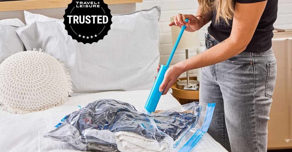Maximize space in your suitcase while keeping your clothing organized and protec...
